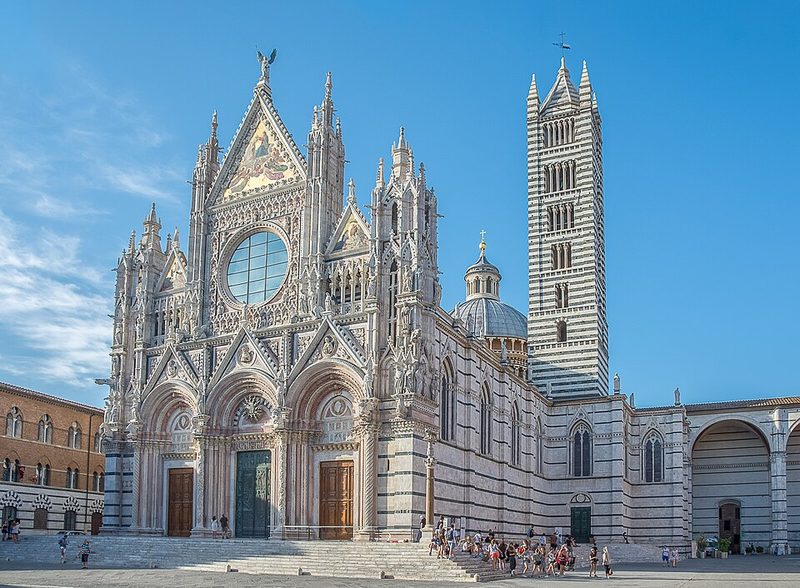 Striped marble nave and columns inside Siena Cathedral
