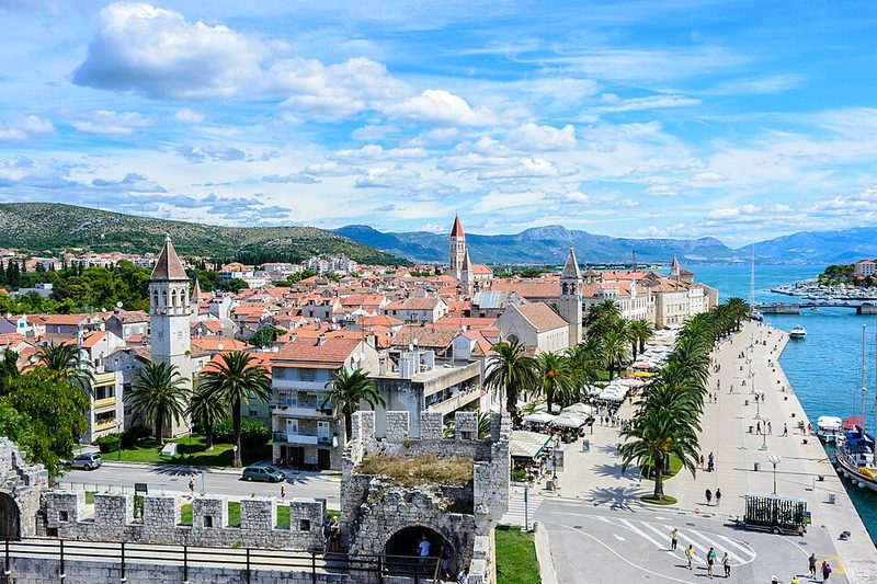 View over Trogir's island old town, waterfront promenade and stone rooftops on Croatia's Adriatic coast